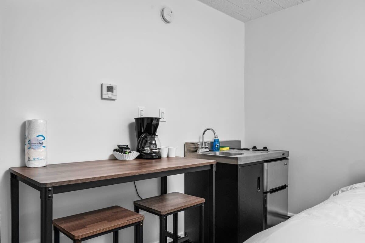 Mini-fridge, microwave, stovetop, coffee/tea maker