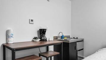Mini-fridge, microwave, stovetop, coffee/tea maker