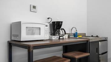 Microwave, stovetop, coffee/tea maker, highchair