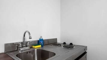 Microwave, stovetop, coffee/tea maker, high chair