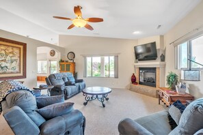 TV, fireplace, books, stereo