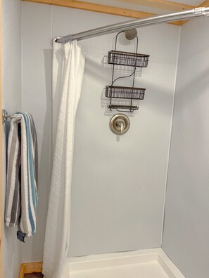 Shower, towels, soap, toilet paper