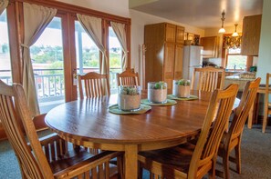 Deluxe Penthouse, Marina View | Living area | 32-inch flat-screen TV with satellite channels - The Swan Hotel (Port Townsend)