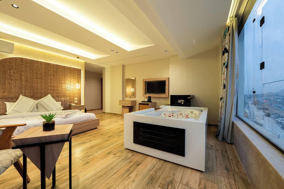 Premium bedding, memory foam beds, minibar (free items), in-room safe
