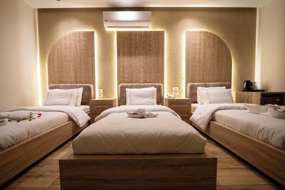 Deluxe Triple Room | 1 bedroom, premium bedding, memory-foam beds, free minibar