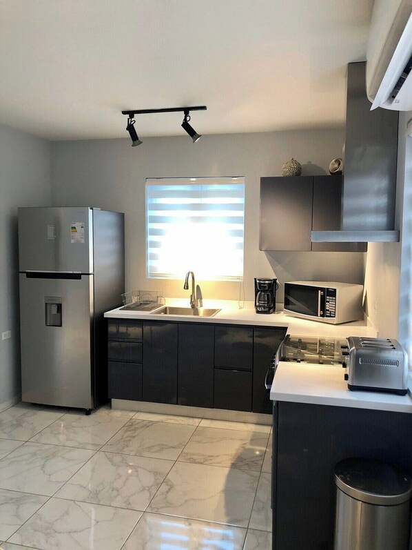 Fridge, microwave, oven, stovetop