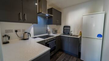 Apartment | Private kitchen | Fridge, microwave, oven, stovetop