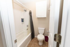 Shower, towels, soap, toilet paper