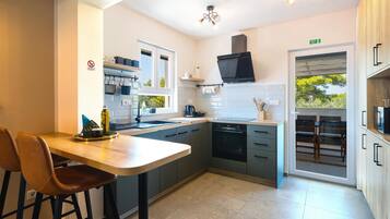 Réfrigérateur, four, plaque de cuisson, lave-vaisselle