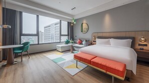 Premium Room, 1 King Bed | In-room safe, blackout drapes, iron/ironing board