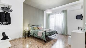 4 bedrooms, desk, iron/ironing board, travel cot