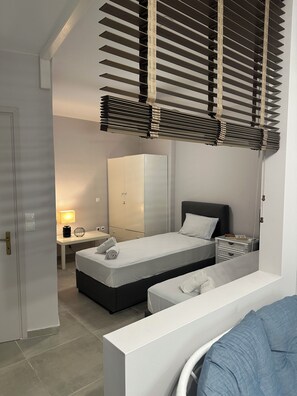 2 slaapkamers, een strijkplank/strijkijzer, gratis wifi, beddengoed