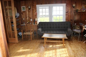 Ferienhaus, Mehrere Betten, Meerblick | Wohnbereich