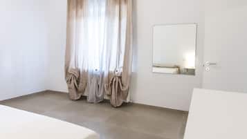 1 habitación y ropa de cama