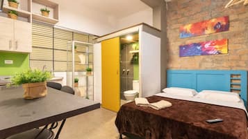 Standard Studio, 1 Bedroom, Ensuite, Ground Floor | Down comforters, desk, laptop workspace, free WiFi