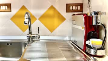 Fridge, oven, stovetop, coffee grinder