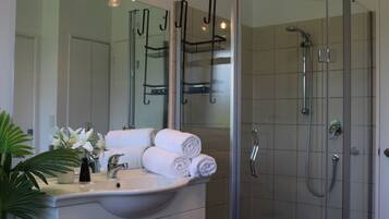 Jetted bath, hair dryer, towels, soap