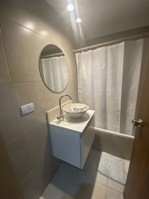 Hair dryer, bidet, towels, soap