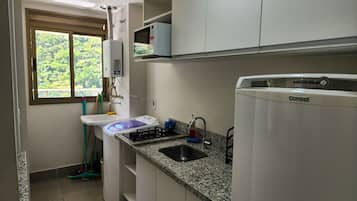 Fridge, microwave, stovetop, coffee/tea maker
