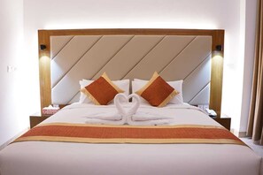 Frette Italian sheets, premium bedding, down comforters