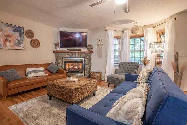 Smart TV, fireplace, foosball, books