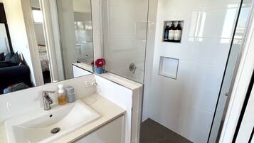 Hair dryer, towels, soap, shampoo