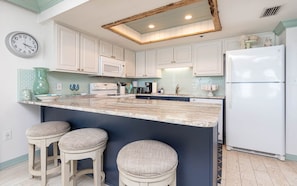 Condo, 3 Bedrooms | Private kitchen | Fridge, oven, coffee/tea maker