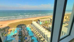 A resort with a pool area, beach view, and multiple buildings. - Sapphire 1706 3 Bedroom Home by RedAwning (South Padre Island)