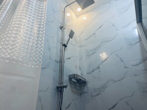 Shower, bidet, towels, soap