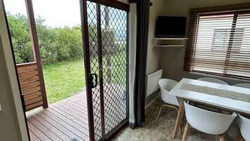 Comfort Cabin, Partial Ocean View | Terrace/patio