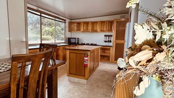 Deluxe Cabin, 3 Bedrooms, Sea View, Beachfront | Private kitchen | Full-size fridge, microwave, electric kettle, cookware/dishes/utensils