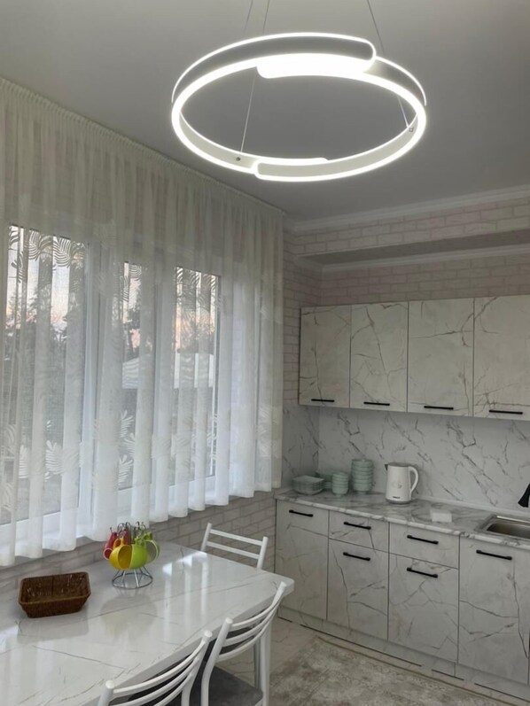 Habitación cuádruple clásica | Zona de estar