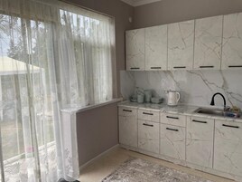 Habitación cuádruple clásica | Zona de estar