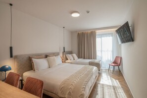 Literie hypoallergénique, minibar, coffres-forts dans les chambres