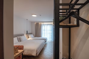 Quarto triplo superior | 1 quarto, roupas de cama antialérgicas, frigobar, cofres nos quartos