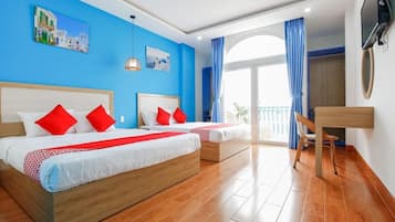Camera Basic con letto matrimoniale o 2 letti singoli | Una cassaforte in camera, tende oscuranti, Wi-Fi gratuito