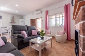 TV, fireplace - Holiday Home "Casa Rural Rafael" with Private Pool, Private Terraces & Wi-Fi (Lantejuela)