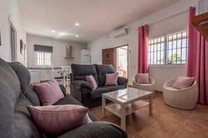 TV, fireplace - Holiday Home "Casa Rural Rafael" with Private Pool, Private Terraces & Wi-Fi (Lantejuela)