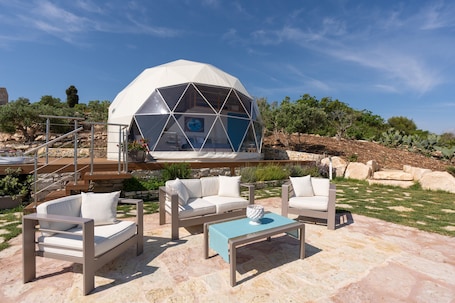 Terrace/patio. Chalet 'Dome On The Hill with Jacuzzi' with Sea View, Wi-Fi and Air Conditioning