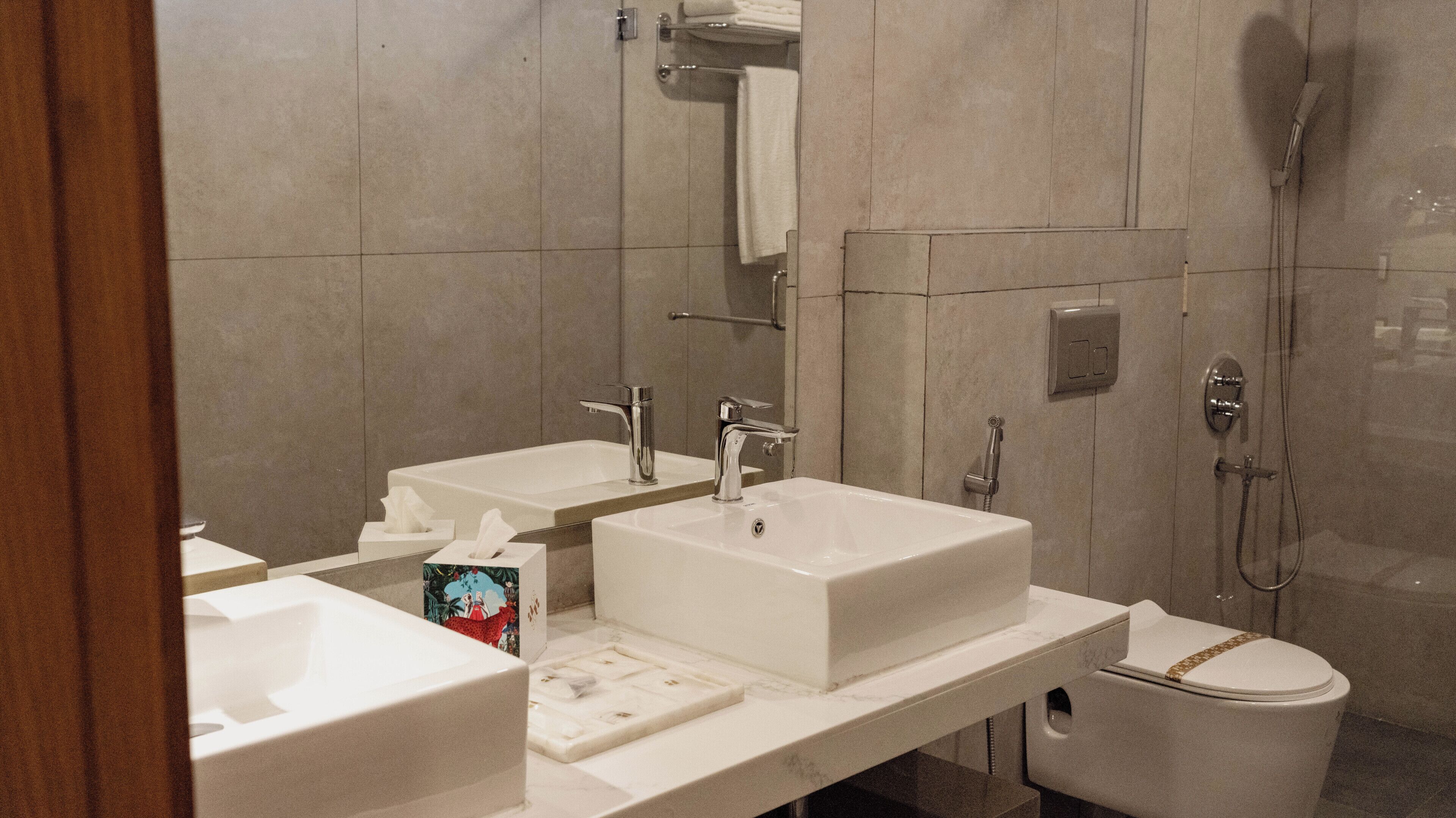 Ambiance Executive Suite | Bathroom | Shower, designer toiletries, hair dryer, bathrobes