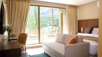 Premium bedding, minibar, desk, laptop workspace