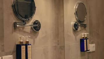 Shower, designer toiletries, hair dryer, bathrobes