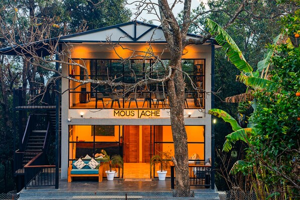 A two-story building with a sign reading "MOUS LACHE" at the entrance. - Moustache Bhimtal Luxuria, Nainital (Nainital)