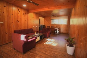 2 BHK Attic Apartment | Living area | 32-inch Smart TV with digital channels, foosball, books - Moustache Bhimtal Luxuria, Nainital (Nainital)