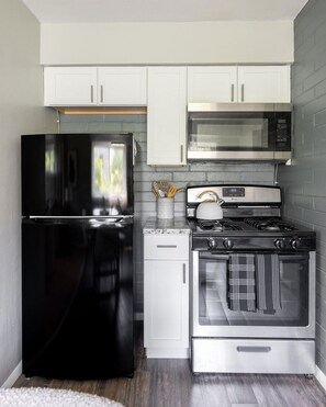 Dishwasher, paper towels, dining tables