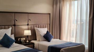 Deluxe-Doppelzimmer | Bettwäsche aus ägyptischer Baumwolle, hochwertige Bettwaren, Zimmersafe