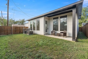 A single-story house with a covered patio area.