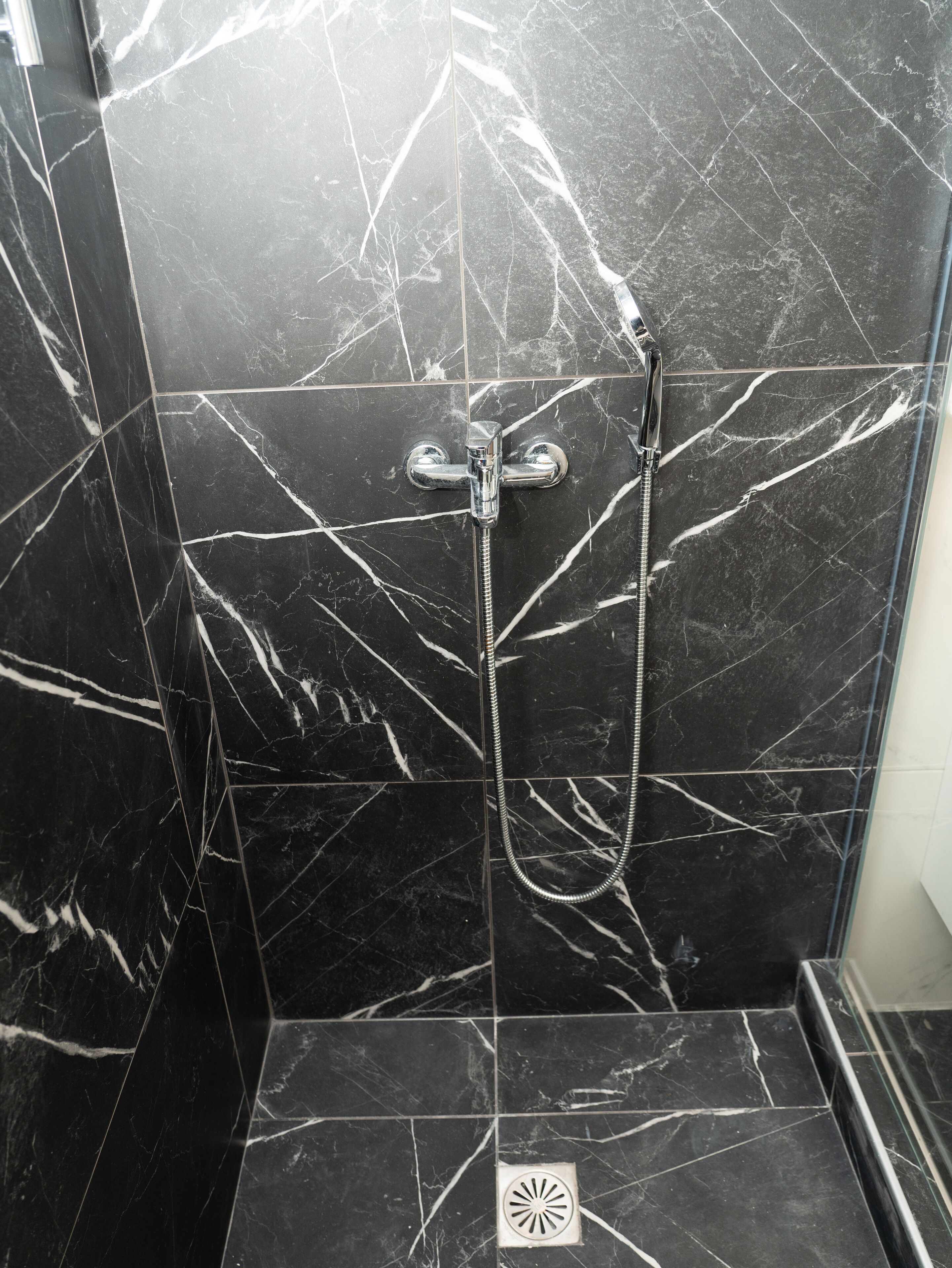 comfort apartment | bathroom | shower, hair dryer, towels, soap