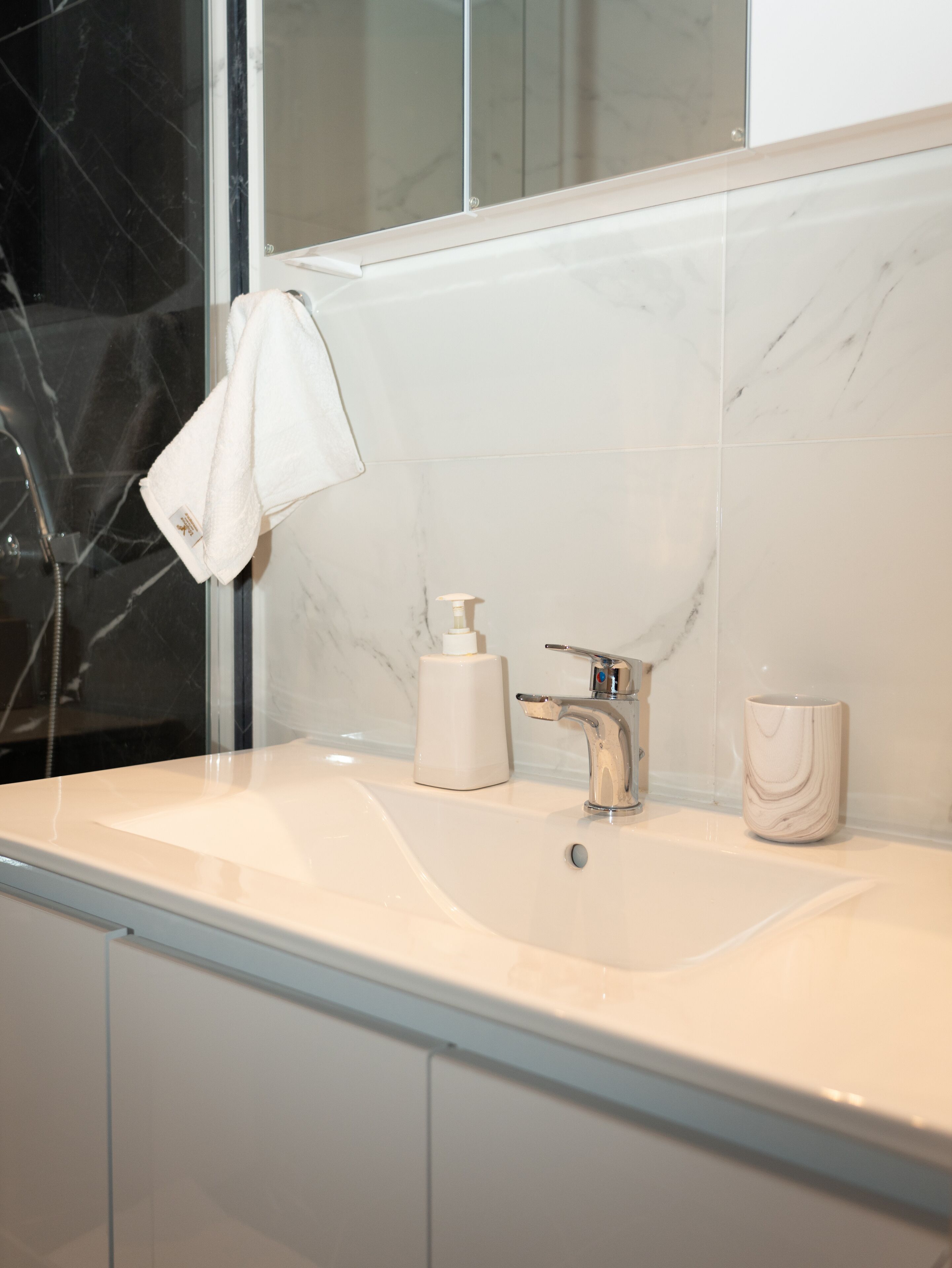 comfort apartment | bathroom | shower, hair dryer, towels, soap