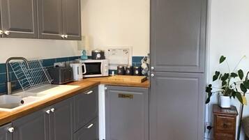 Apartemen | Dapur pribadi | Lemari es, microwave, oven, dan kompor